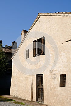 Facade with windows of Giuseppe Verdi`s country house. Birthplace of the Italian musician Giuseppe Verdi