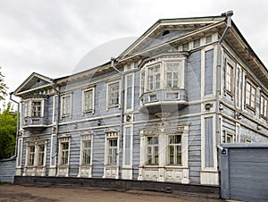 Facade of wooden house of Decembrist Sergei Volkonsky in Irkutsk in summer in cloudy weather