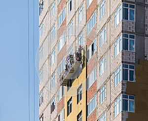 Facade work and insulation of a multistory building