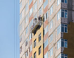 Facade work and insulation of a multistory building