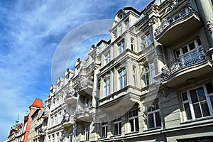 Facades with balconies of historic tenement houses