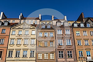 Facades of colorful old Medieval houses in Stare Miasto, Warsaw, Poland