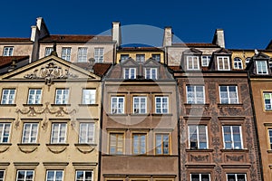 Facades of colorful old Medieval houses in Stare Miasto, Warsaw, Poland