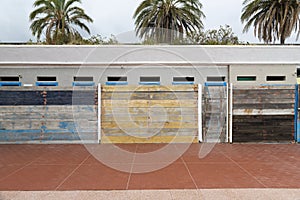 Facades covered with wooden planks to protect against winter weather and sea storms