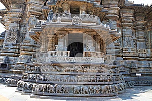 Facades and decorative friezes with deities, dancers and other figures, Chennakeshava temple. Belur, Karnataka. South West view. photo