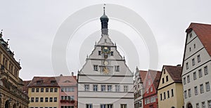 The facades of historical buildings at Rothenburg ob der Tauber where is the fortified city at Germany.