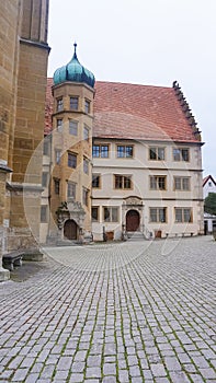 The facades of historical buildings at Rothenburg ob der Tauber where is the fortified city at Germany.