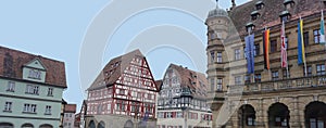 The facades of historical buildings at Rothenburg ob der Tauber where is the fortified city at Germany.