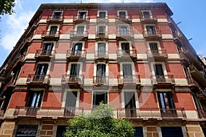 Facades of houses in the area of Eixample in Barcelona