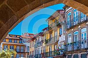 Facades of houses at Largo da Oliveria in the old town of Guimaraes, Portugal