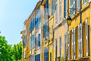 Facades of houses in the old center of Aix-en-Provence, France photo