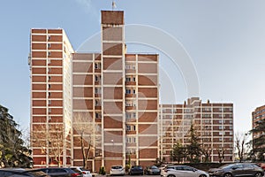 Facades of housing blocks in urbanization with parking without cover