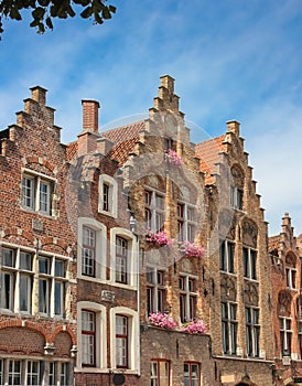 Facades. Jan Van Eyck Square. Bruges. Belgium photo