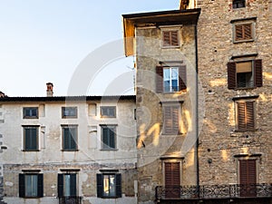 Facades of medieval apartment houses in Bergamo photo