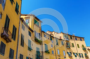 Facades of old buildings in Lucca, Italy