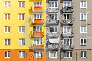 Facades before and after renovation. Comparison of old and new facade. Building after renovation.