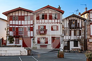 Facades of typical Basque houses in the touristic village of Ainhoa, France