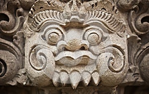 Face of the ancient deities carved in stone. Indonesia, Bali