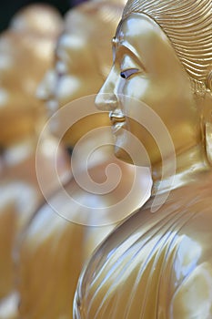 The face of an ancient stone buddha in a temple in Thailand