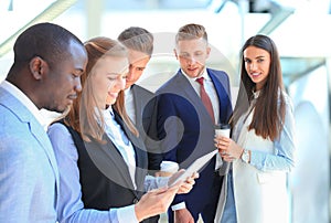 Face of beautiful woman on the background of business people