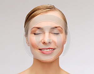 Face of beautiful woman with closed eyes