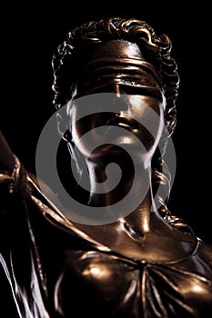 Face of the blind goddess of justice
