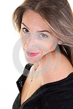 Face of blonde beautiful girl with fashion black top natural woman makeup in studio shot