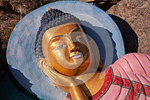 Face of Buddha in Sleeping lion`s posture or Reclining Buddha.
