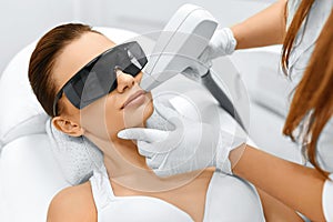 Face Care. Facial Laser Hair Removal. Epilation. Smooth Skin. photo