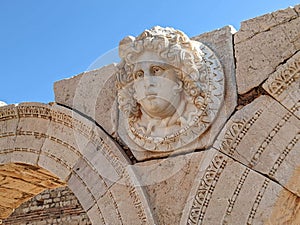 A face carved on marble - Leptis Magna