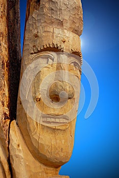 Face Carved on Tree Trunk