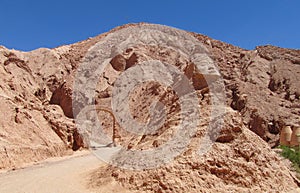 Face carving on a mountain in Valle Quitor, San Pedro de Atacama
