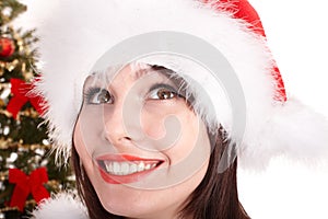 Face of christmas girl in santa hat.