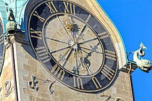 Face of the clock of the Fraumunster Cathedral in Zurich photo