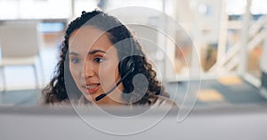 Face, computer and a woman in a call center for customer service or support with a headset microphone. Contact us, crm