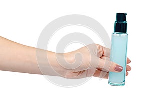 Face cream in glass bottle with dispencer. Blue container