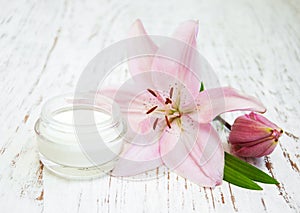 Face cream with lily flowers