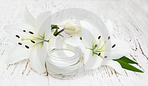 Face cream with lily flowers