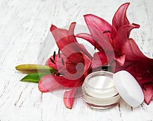 Face cream with lily flowers