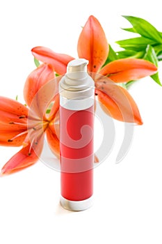 Face cream/lotion with lily flowers,on white