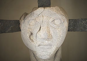 Face on a cross