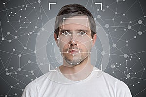 Face detection and recognition of man. Computer vision and artificial intelligence concept