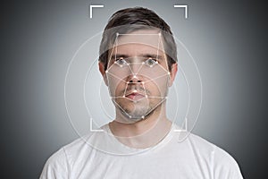 Face detection and recognition of man. Computer vision and artificial intelligence concept photo