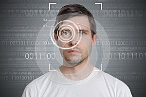 Face detection and recognition of man. Computer vision concept. Binary code in background