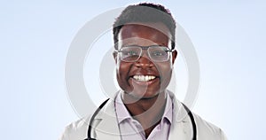 Face, doctor and black man with glasses, healthcare and medicare on a studio blue background. Portrait, medical