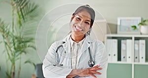 Face, doctor and woman with arms crossed, smile and office with healthcare and professional. Portrait, general