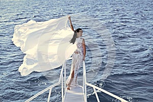 Face fashion girl or Women in your web site. Girl face portrait in your advertisnent. Bride on sunny windy day on blue