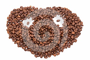 Face formed with roasted organic coffee beans, isolated