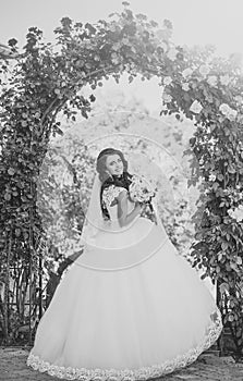 Face girl for magazine cover. Girl face portrait in your advertisnent. Bride with long brunette hair with flower.