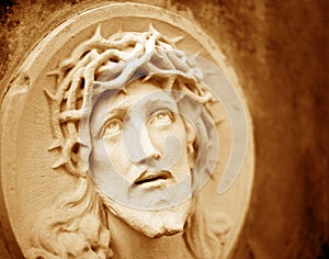 The face of Jesus Christ in a crown of thorns as a symbol of suffering and salvation of mankind. (healing, spiritual